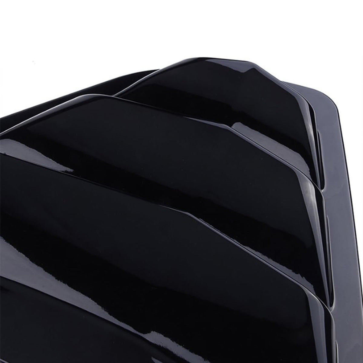 Close-up of glossy black ABS louver fins from the 4PCS kit for Toyota Camry 2025-2026, designed for aerodynamic styling.