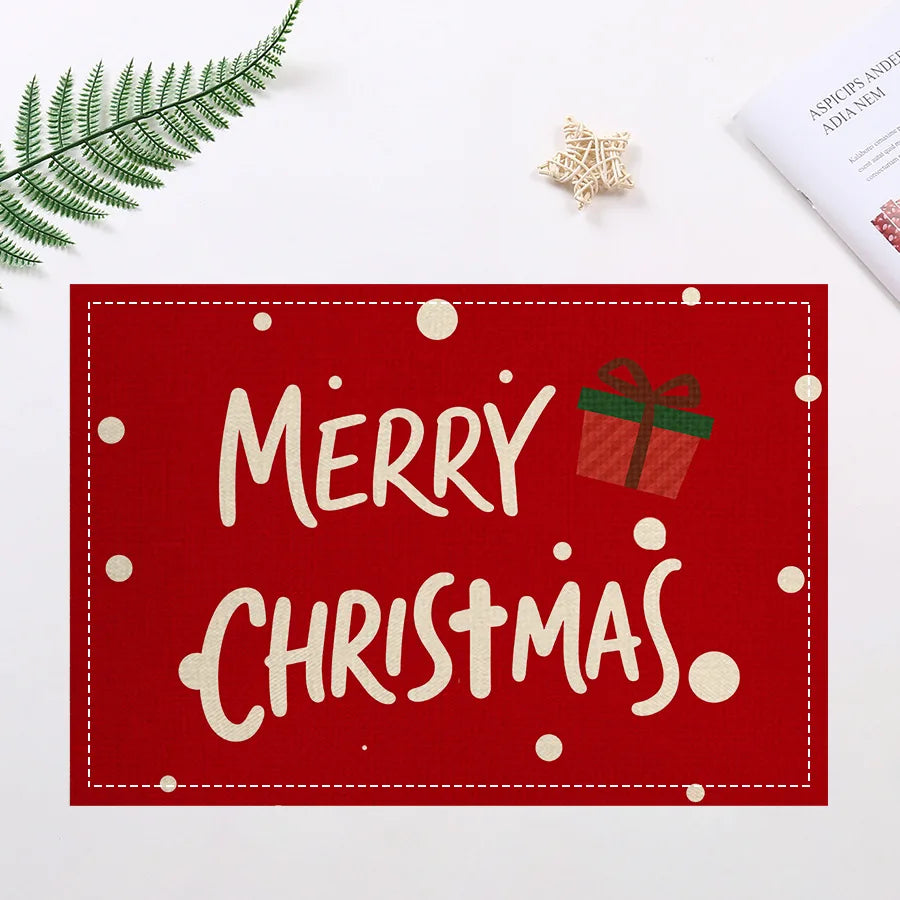 Insulated holiday placemat with 'Merry Christmas' text and festive red design, perfect for seasonal dining room decor.
