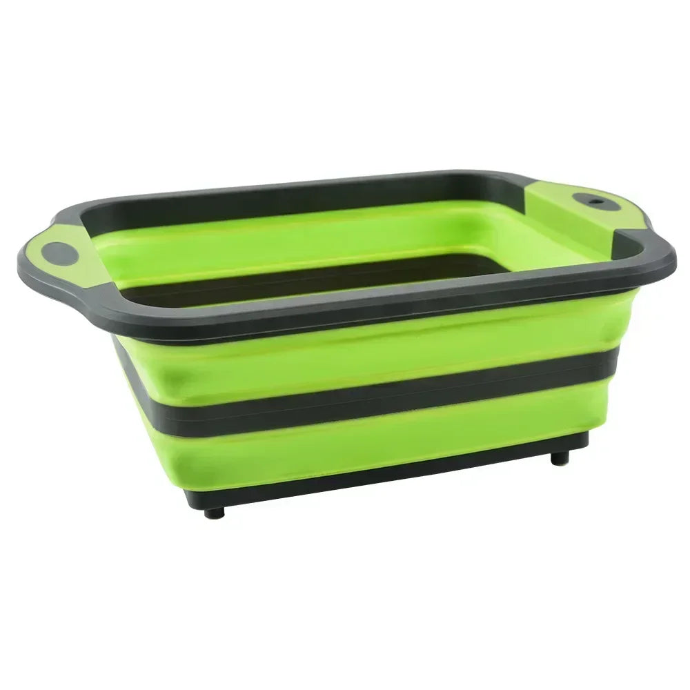 Green and gray Collapsible Cutting Board Sink in expanded form with drain plug, perfect for camping cookware and efficient food prep.