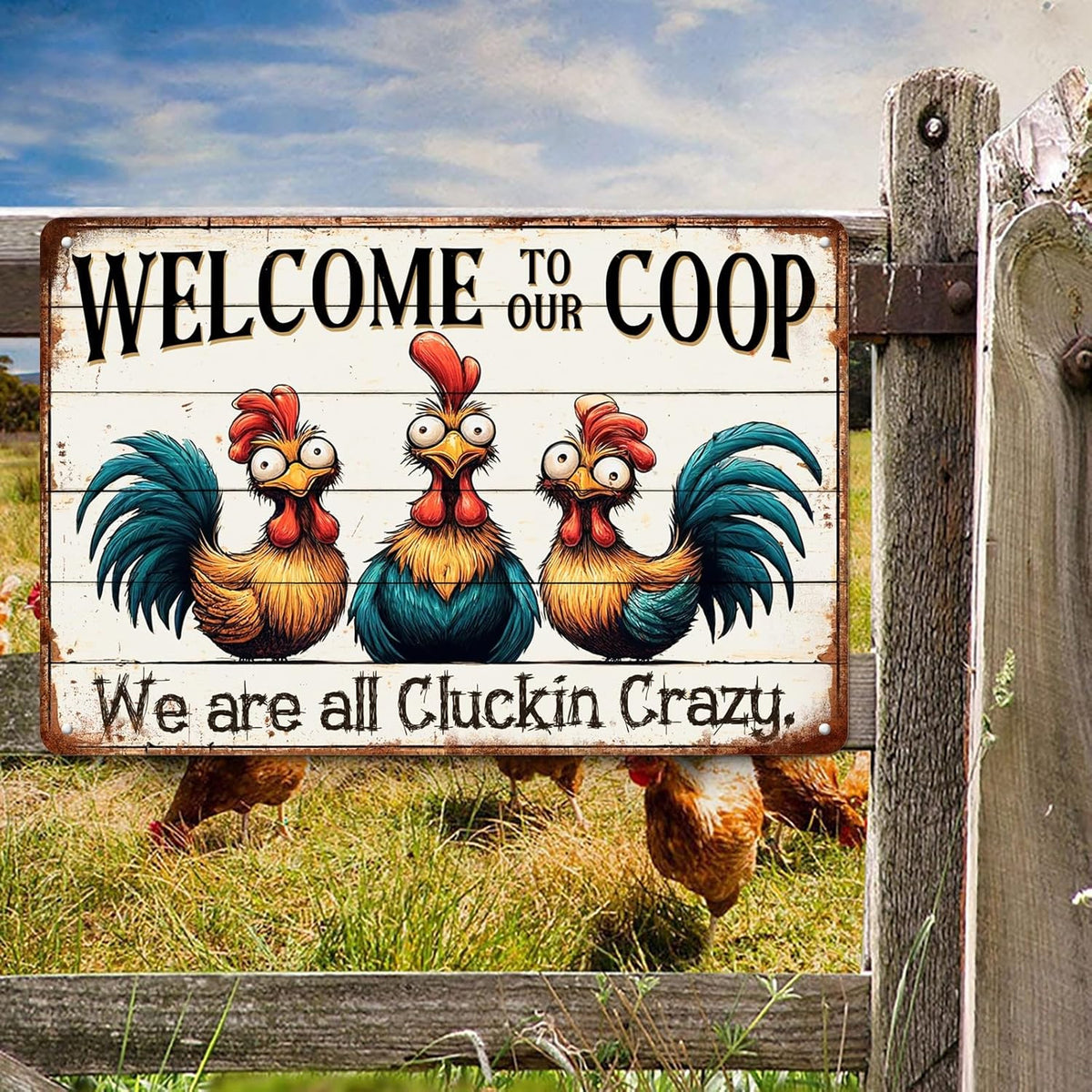 Vintage Chicken Coop Tin Sign mounted on a wooden fence in a farm setting with chickens in the background, ideal for farmhouse decor.