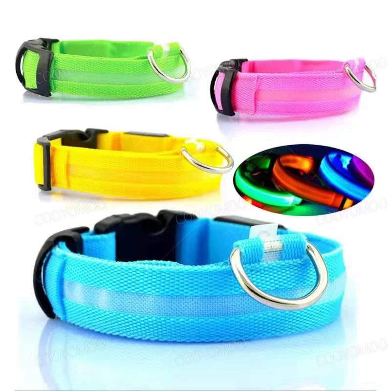 Assorted LED dog collars in green, yellow, pink, and blue with glowing strips, highlighting vibrant options for pet visibility.