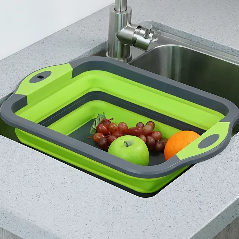 Collapsible Cutting Board Sink placed in kitchen sink with fruits inside, showcasing its draining and washing functionality for outdoor or home use.