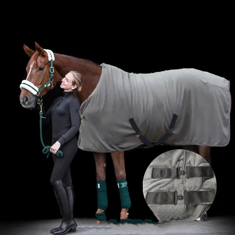 Durable Warmth Horse Fleece Blanket with adjustable belly straps, shown with rider, designed for equestrian care and comfort.