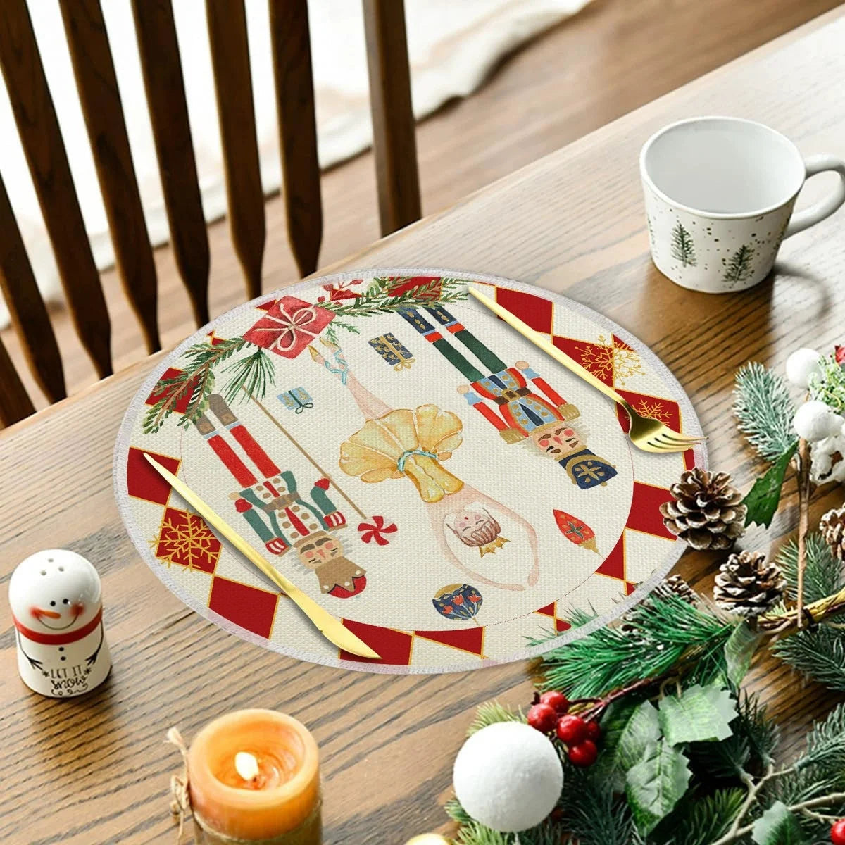 Close-up of Christmas round linen placemat with Nutcracker and ballerina, styled on a wooden table with festive decorations.