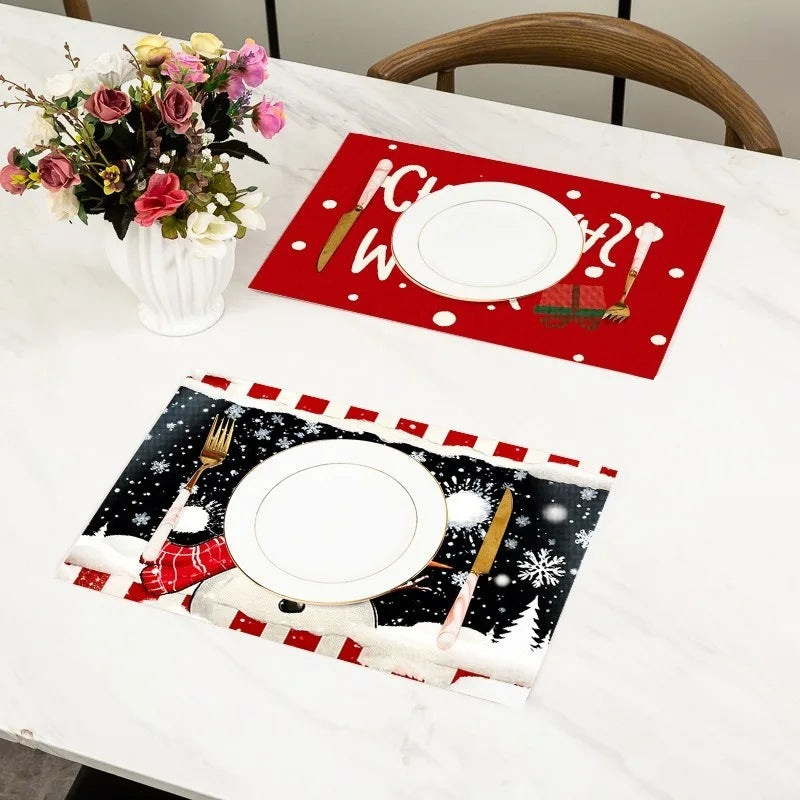 Festive Christmas placemats with snowman and holiday text, enhancing seasonal table settings with charm and insulation.