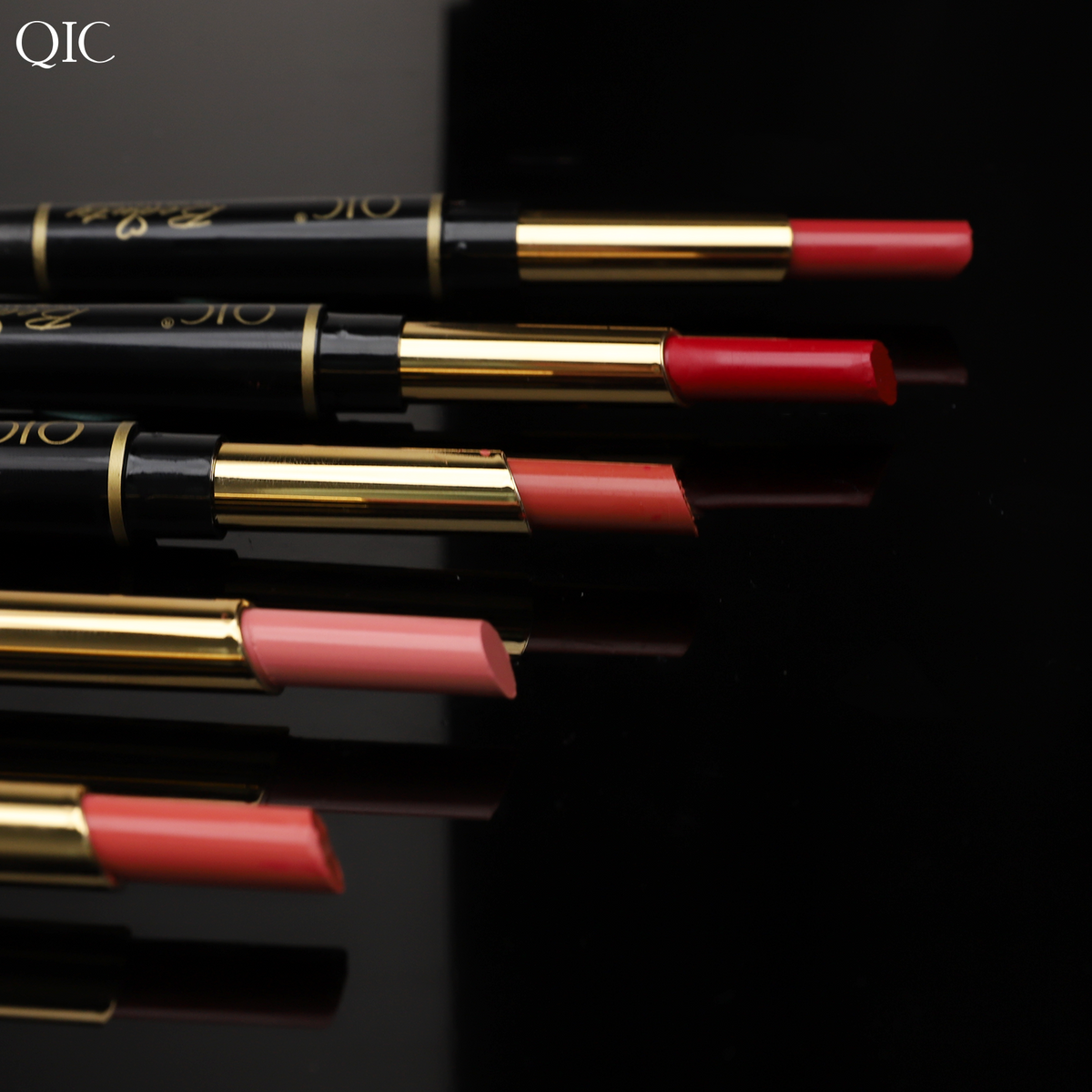 Close-up of lipstick tips in various shades from the 2-in-1 Dual-Ended Lipstick & Liner Matte Waterproof & Transfer-Proof collection on black background
