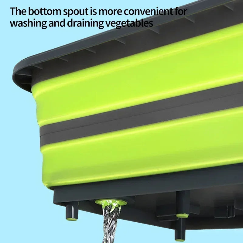 Close-up of drain plug on Collapsible Cutting Board Sink showing water draining, designed for efficient vegetable washing and outdoor cooking.
