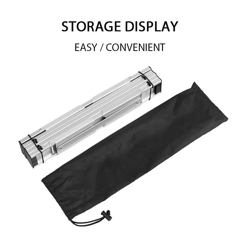 Folded Ultralight Camping Table with storage bag. Compact aluminum travel desk for easy transport and storage.