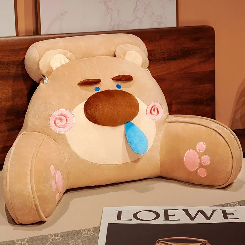 Brown bear cartoon sofa backrest pillow with blue tongue and pink paw prints, designed for lumbar support and cozy decor.
